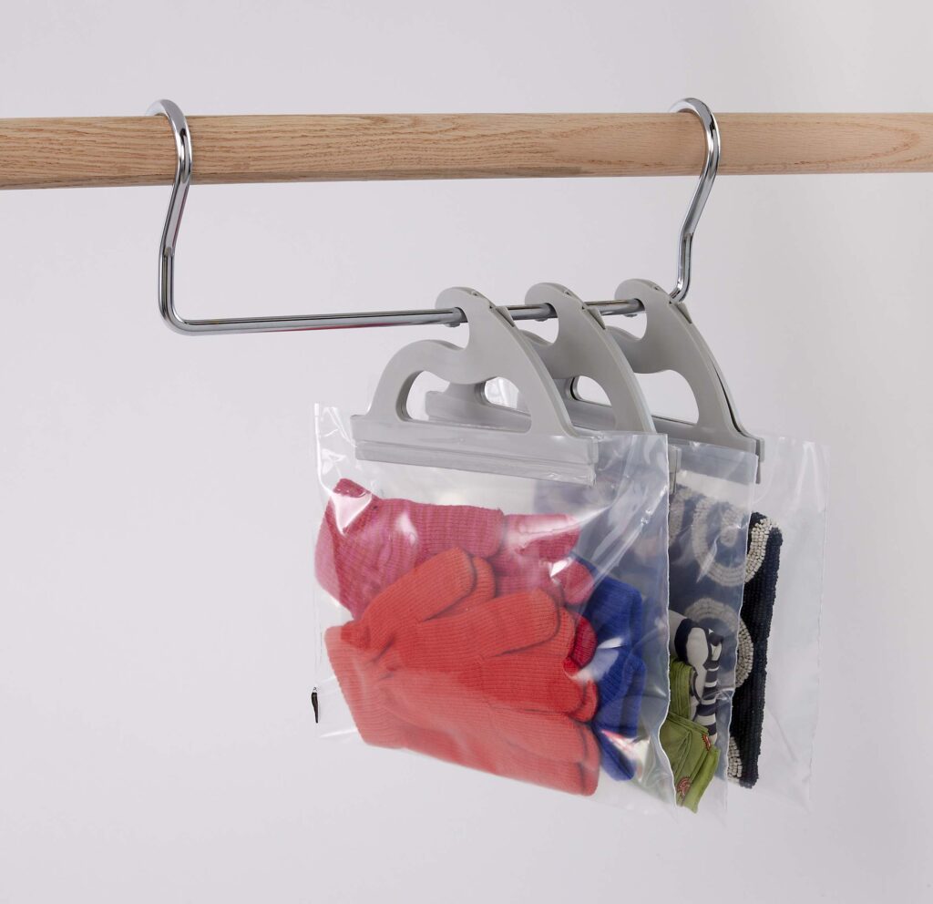 Metal adaptor for standard closet rod to hang multi-use poly storage bags